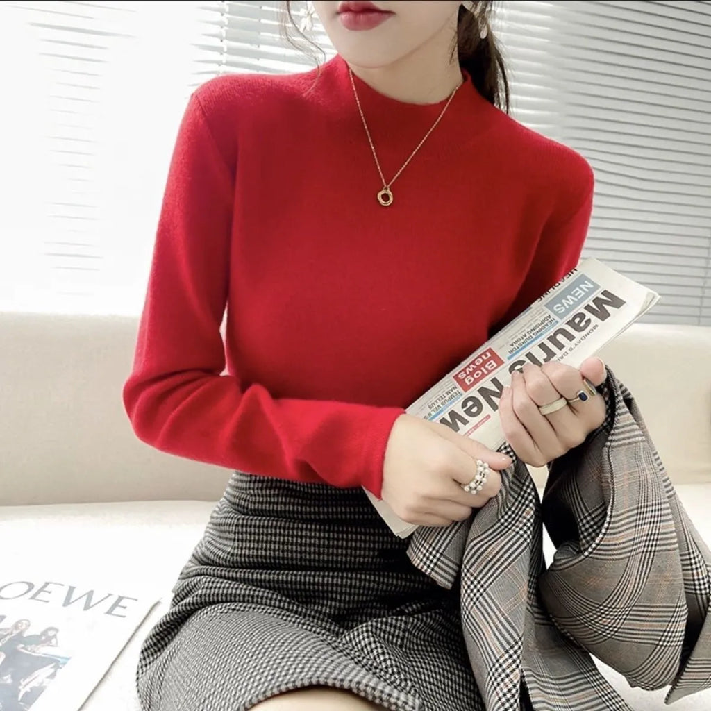 Slim fit viscose long sleeve top for women in apricot colour, showing front view.