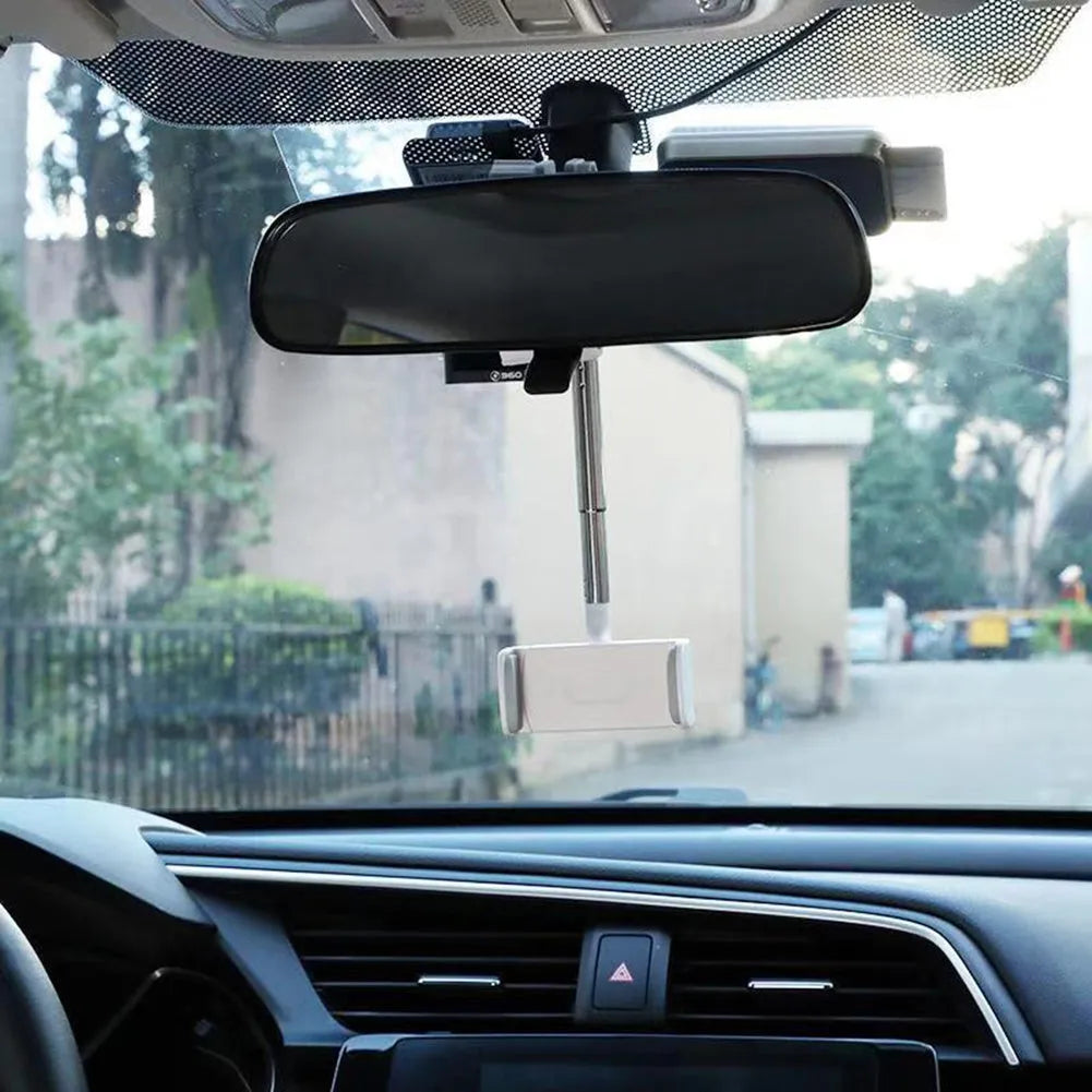 Black ABS car rearview mirror phone holder with 360-degree rotation mounted on a car mirror