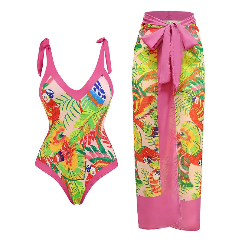 Retro pink floral print one-piece swimsuit with V-neck, covered belly and thin skirt overlay