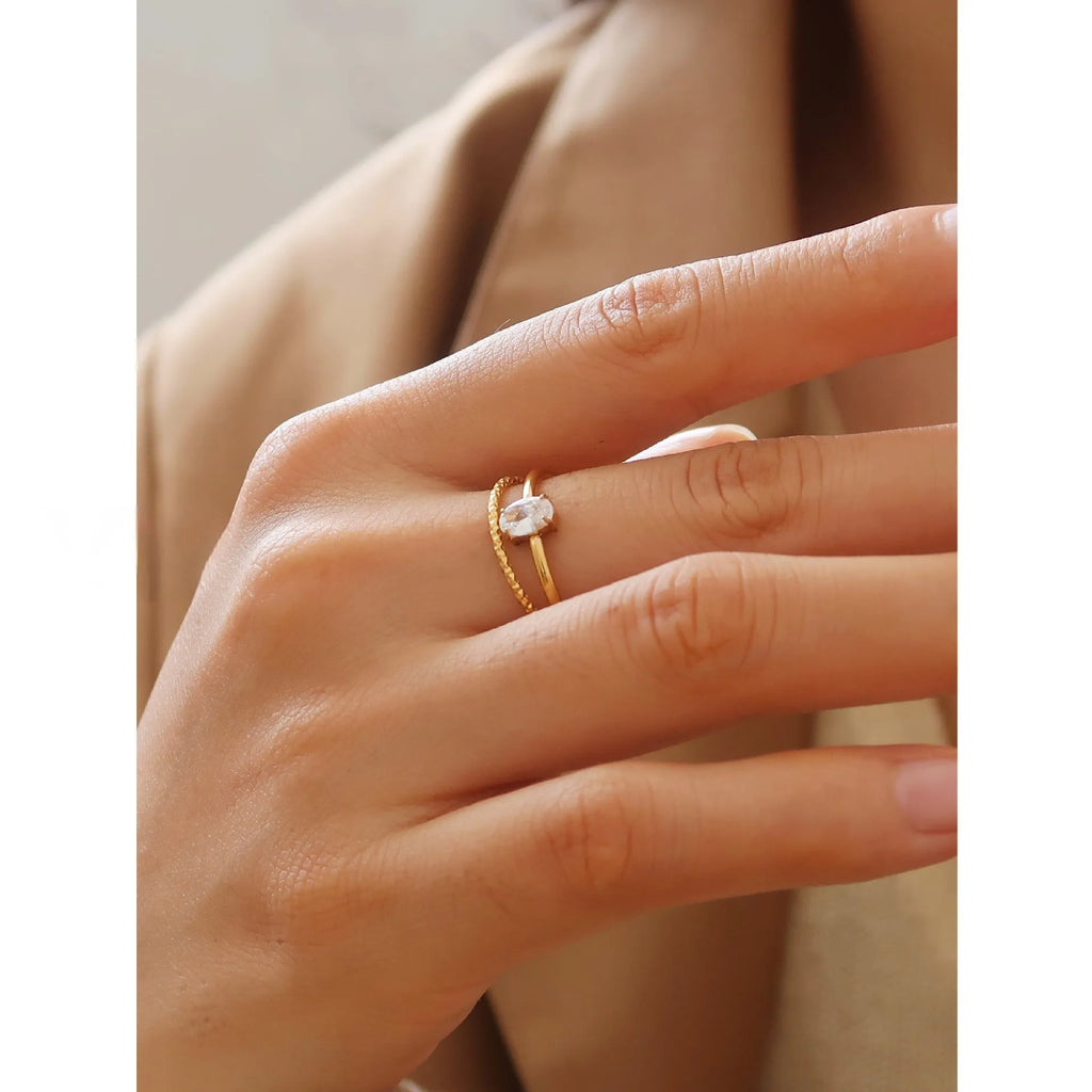 Golden stainless steel love heart or oval shaped simple bracelet ring for women in sizes 5 to 8