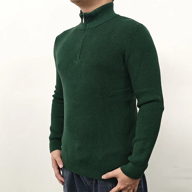 Men's black half-turtleneck zipper sweater pullover on a hanger.