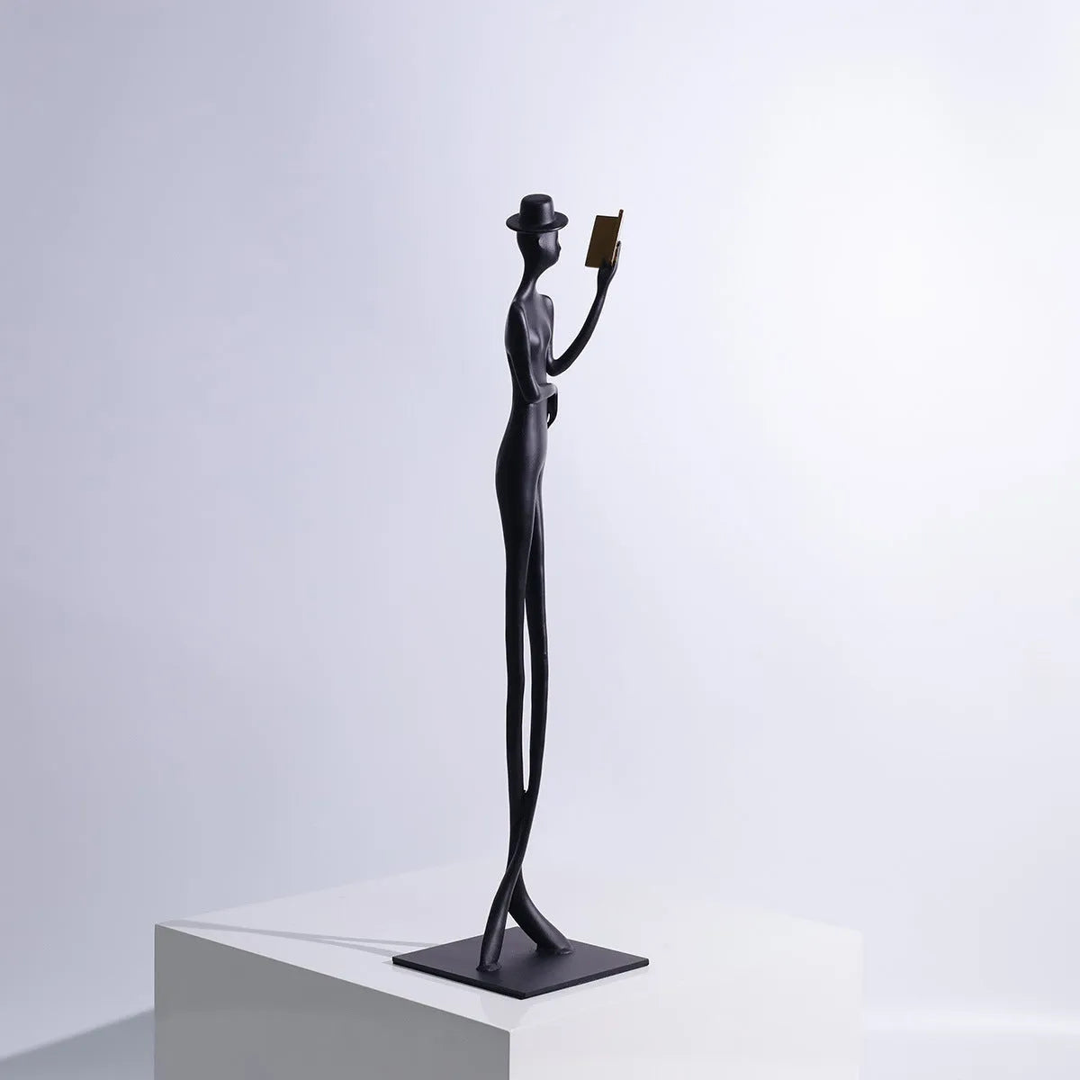 Black aluminium reading woman desktop sculpture modern minimalist design