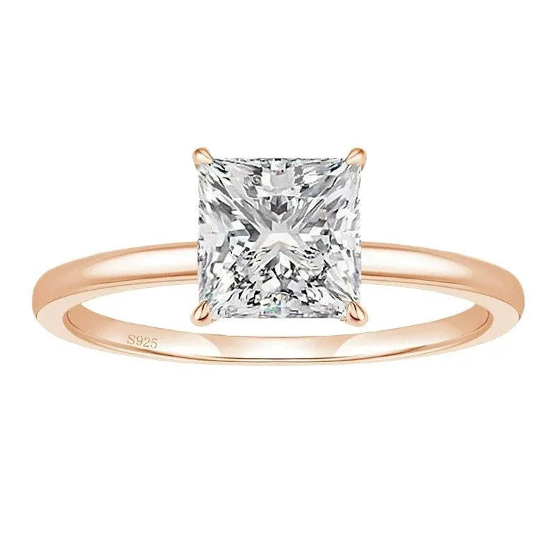 A geometric 925 sterling silver ring with a round zirconium detail, shown in silver, gold, and rose gold colour options.