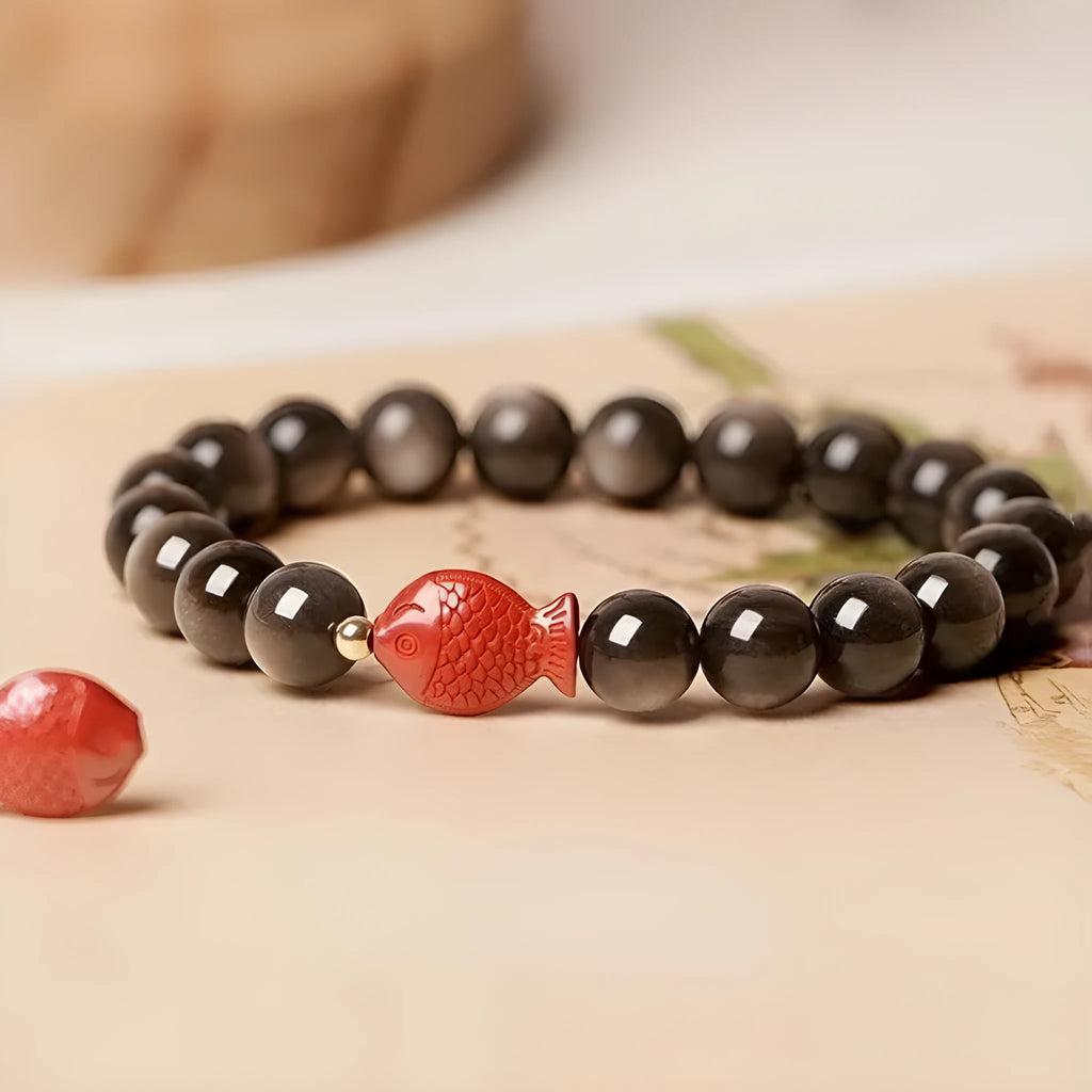 Natural obsidian bracelet with cinnabar fungal accents showing round beads in available sizes
