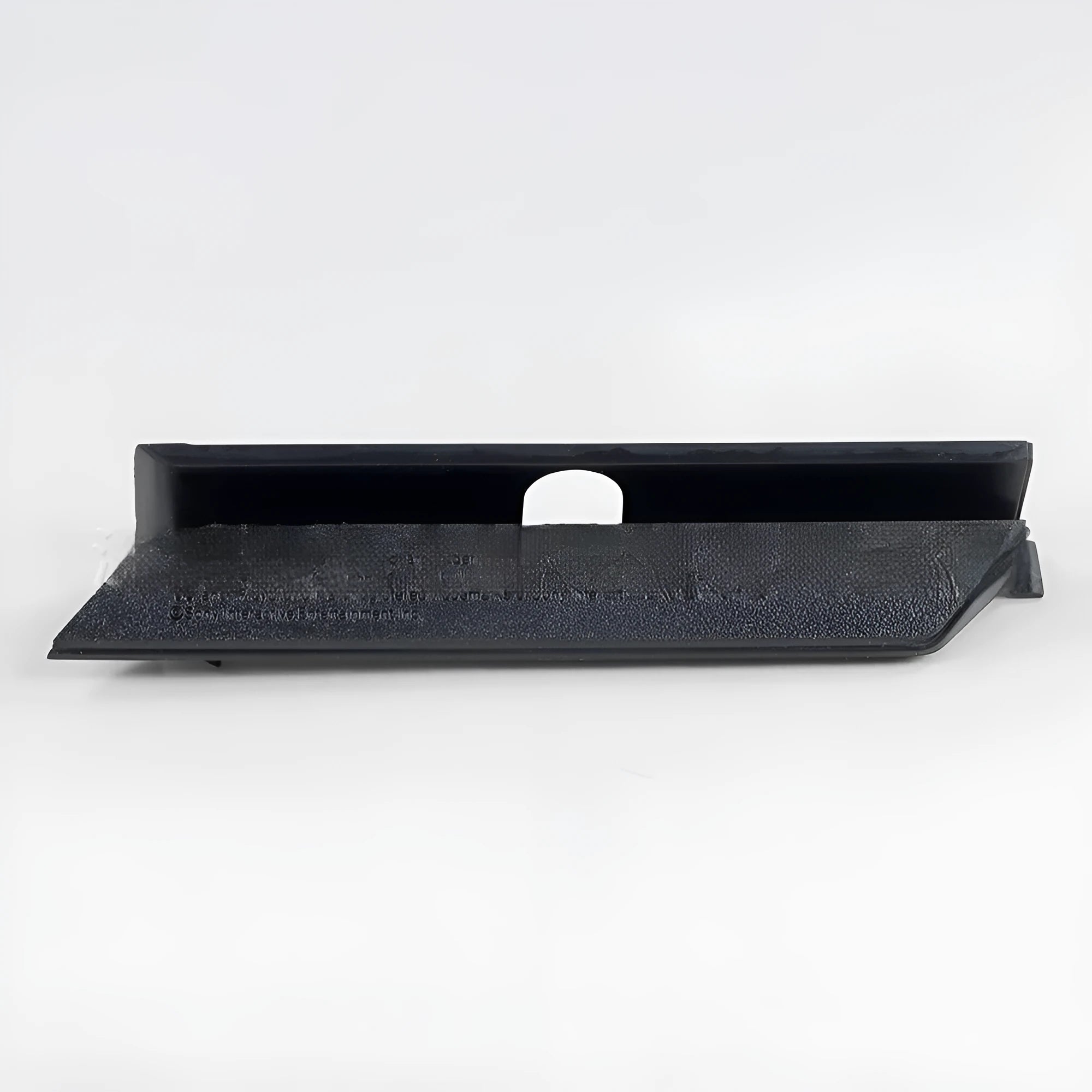 A black plastic hard drive cover or baffle bin for storing an internal hard disk.