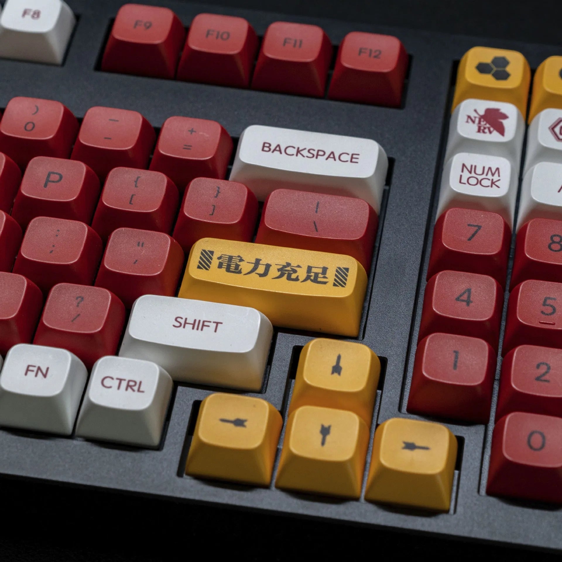 138 PBT sublimation keycaps in a boy and girl colour matching design laid out on a table.