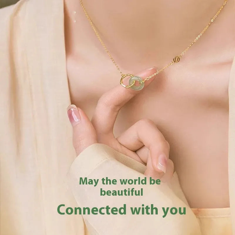Sterling silver bamboo joint peace buckle necklace on an adjustable O-ring chain with a geometric pearl detail.