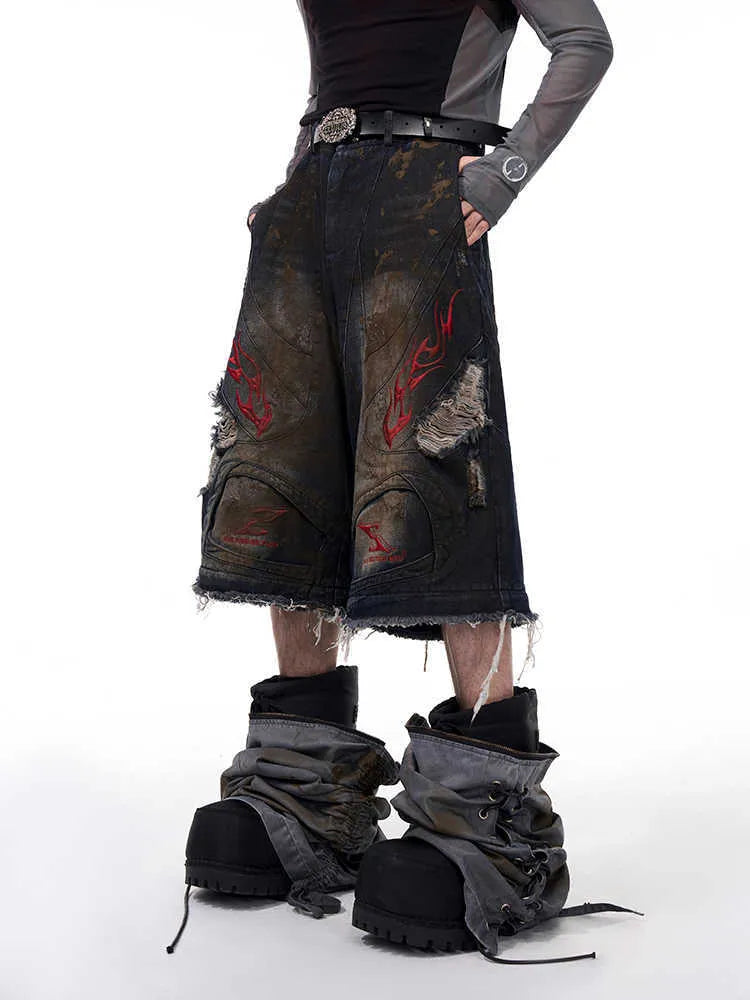 Men's loose-fit retro jeans with detachable trouser legs in denim.