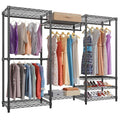 Black floor standing metal clothes storage rack with garments hanging