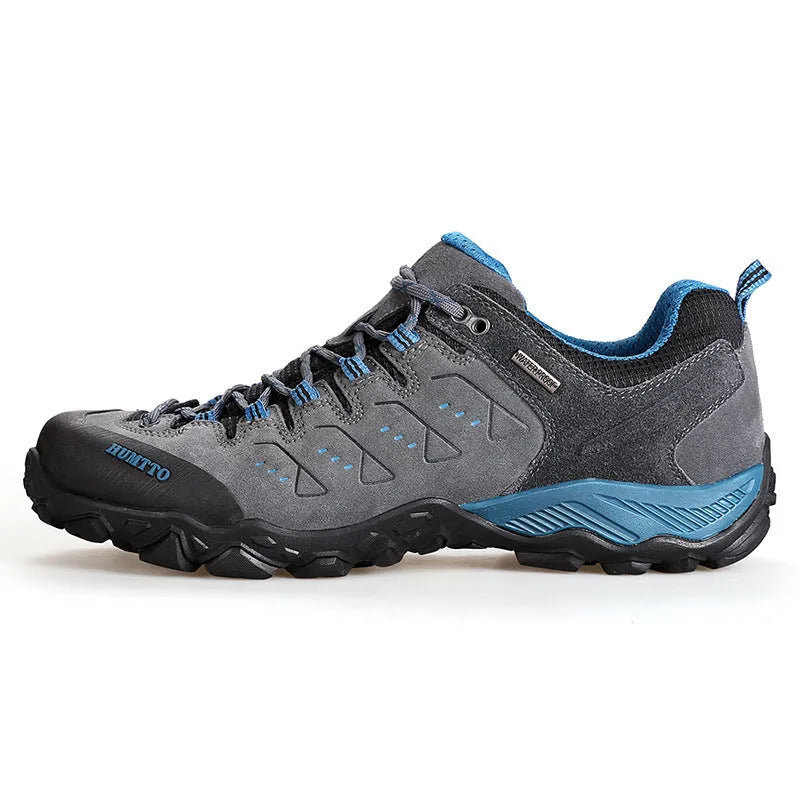 Men's black low top lightweight hiking shoes with EVA outsole and rubber sole on outdoor trail