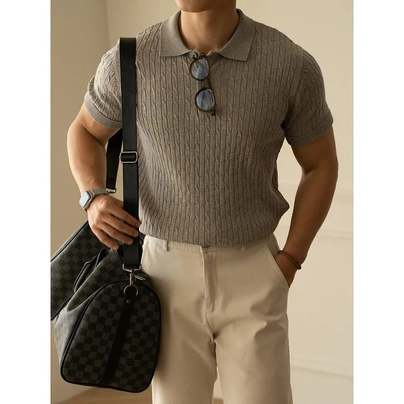 Men's khaki short sleeve business casual top laid flat, showing collar and button placket detail.