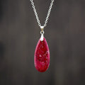 Emperor Stone jade pendant necklace on an 18k gold plated chain with a water drop shape.