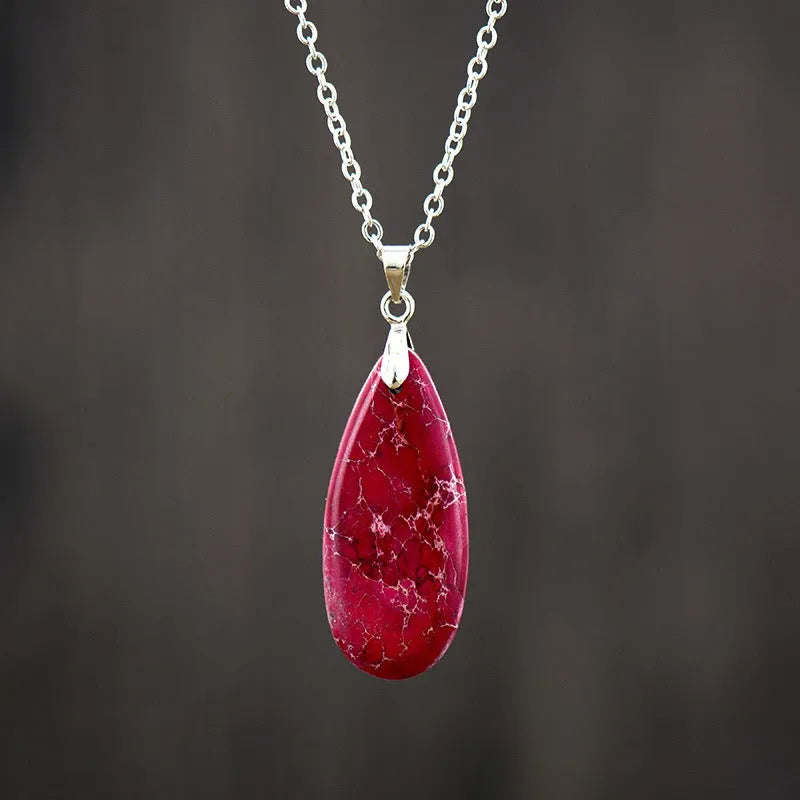 Emperor Stone jade pendant necklace on an 18k gold plated chain with a water drop shape.