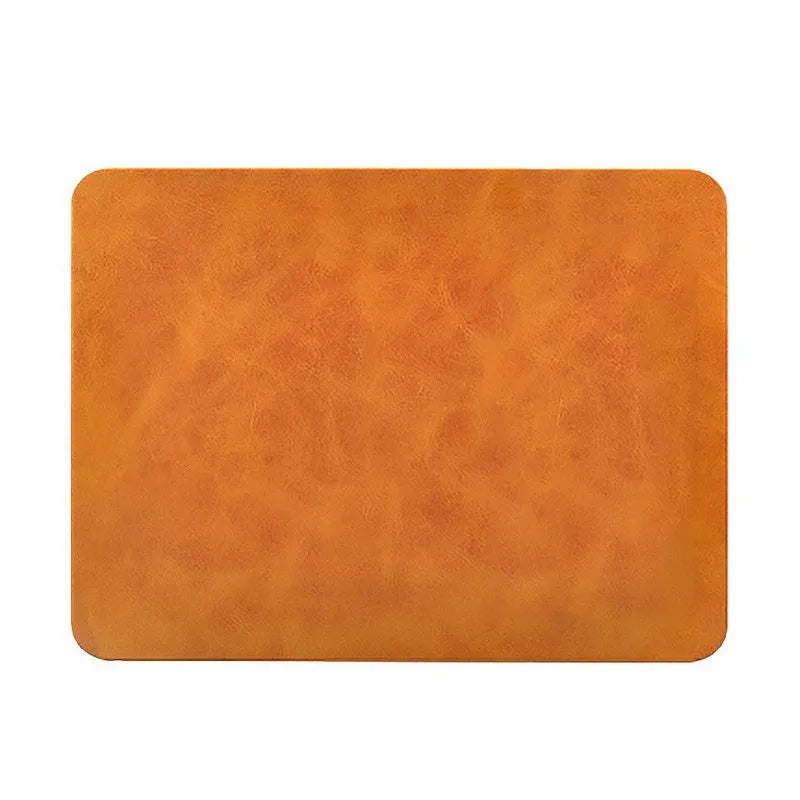 Brown leather-texture wireless charging mouse pad with a Micro USB cable for Qi device charging.