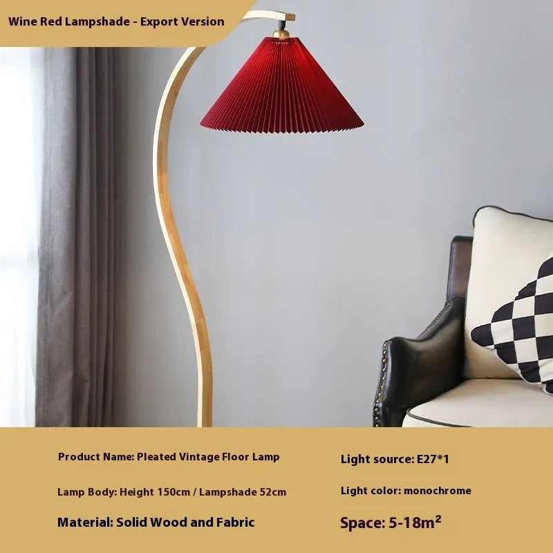 Vertical retro-style table lamp with a choice of log white or wine red shade on a narrow table.