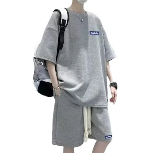 Men's cotton polyester waffle texture short sleeve top and shorts leisure sports suit set on a hanger.