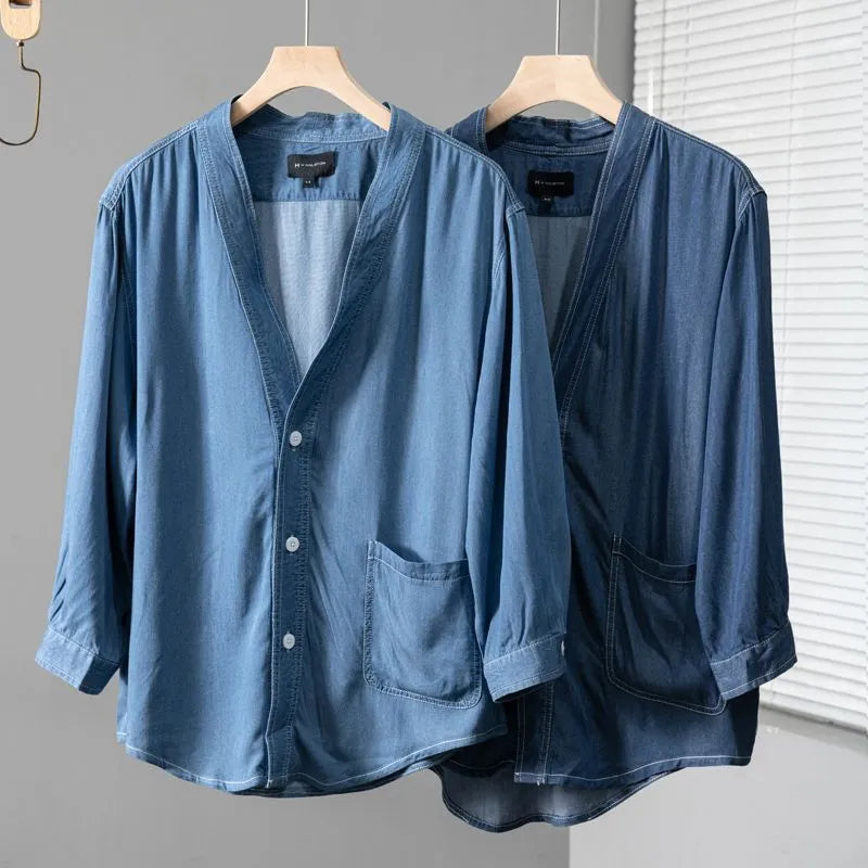 Men's dark blue three-quarter sleeve denim coat with V-neck collar and side pockets