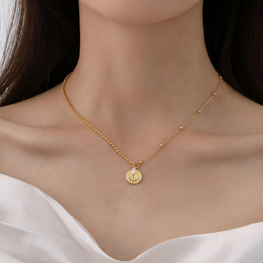 Hong Kong style necklace with natural pearl and shell pendant on stainless steel chain