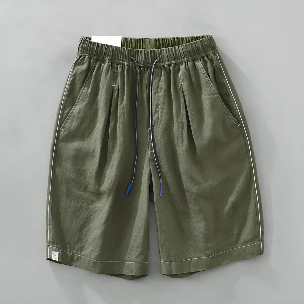 Men's straight-leg linen shorts in black or green with drooping style and drawstring mid-waist.