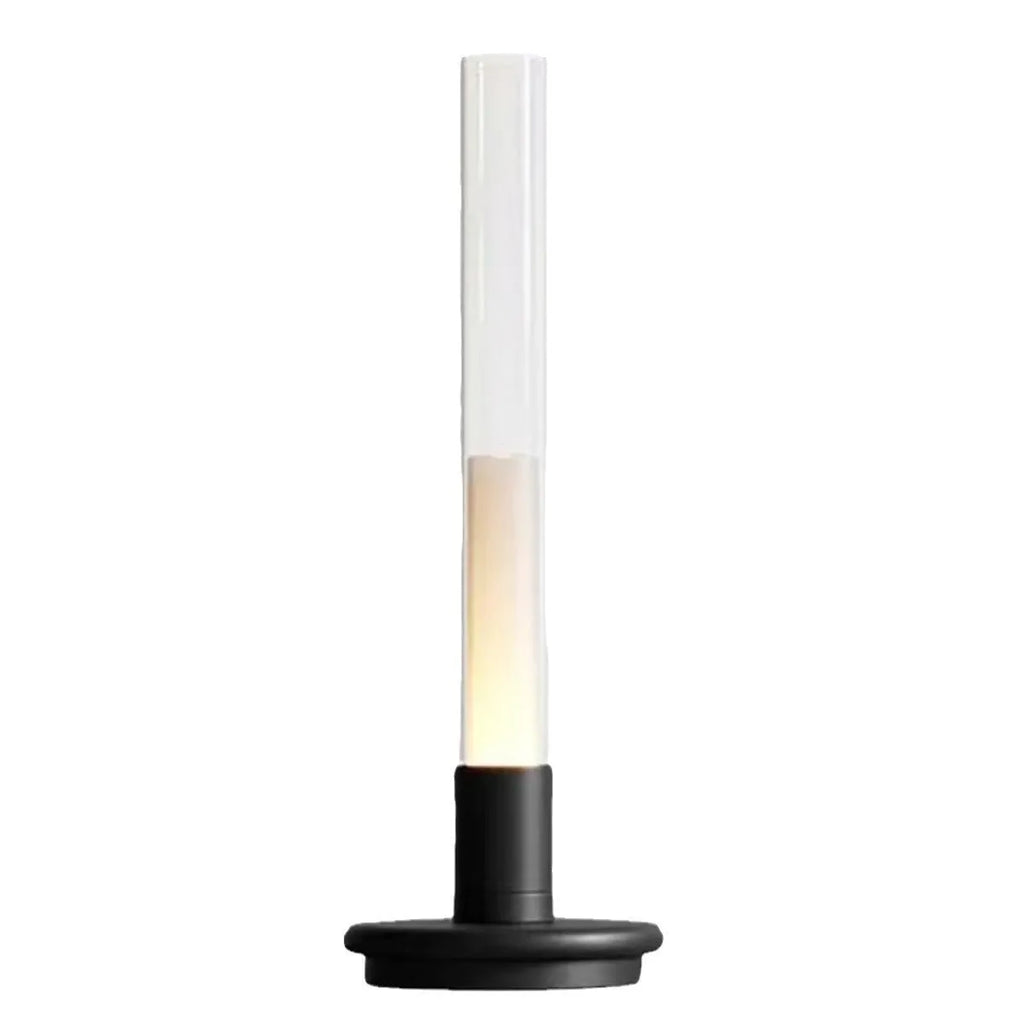 Black Nordic style candlelight table lamp showing three-colour LED light settings on a wooden desk.