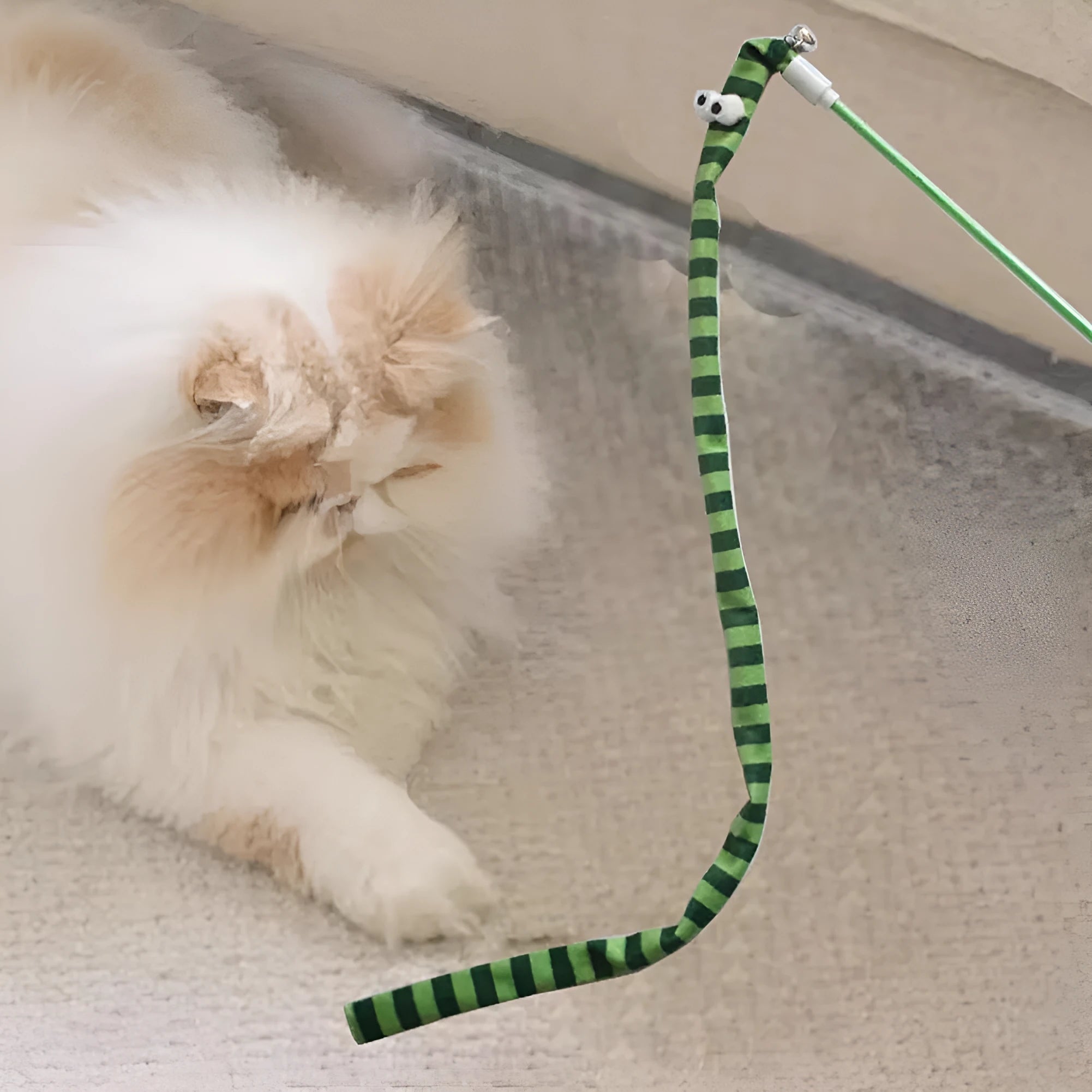 Cat wand toy with polycarbonate wand and long plush strip in vibrant colours for interactive play