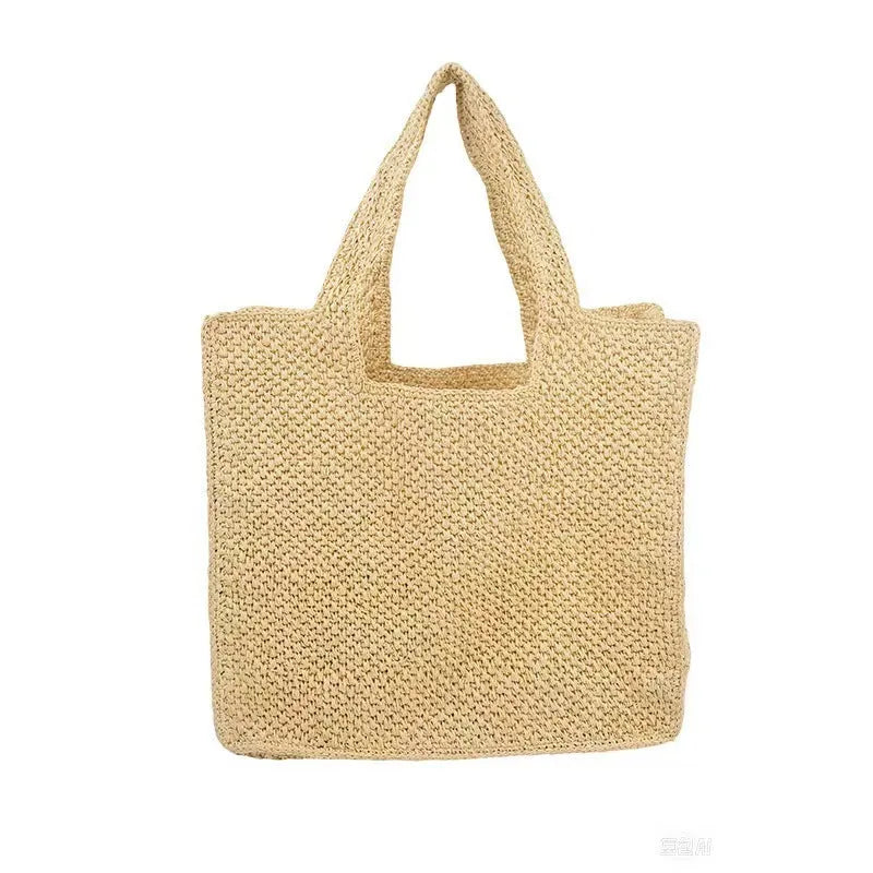 Straw woven commuter tote bucket bag with horizontal square shape and woven texture