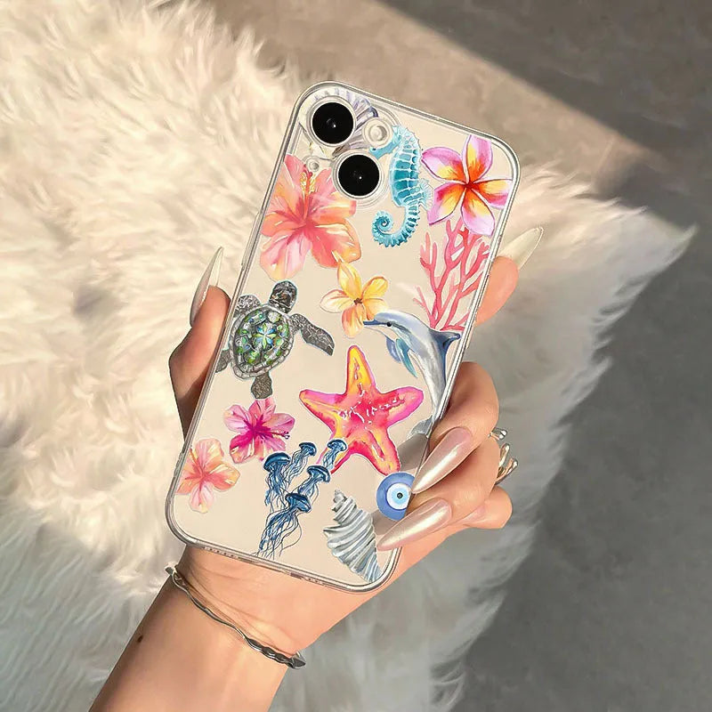 Transparent TPU iPhone case with hand-painted dolphin and turtle design on soft shell