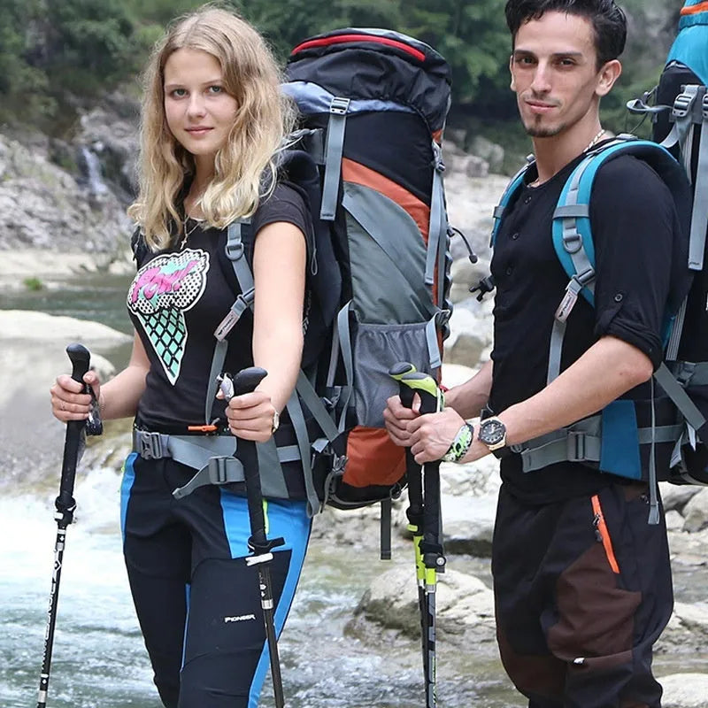 Carbon fibre folding climbing cane with tungsten steel tip in matte black colour, shown in extended and folded positions