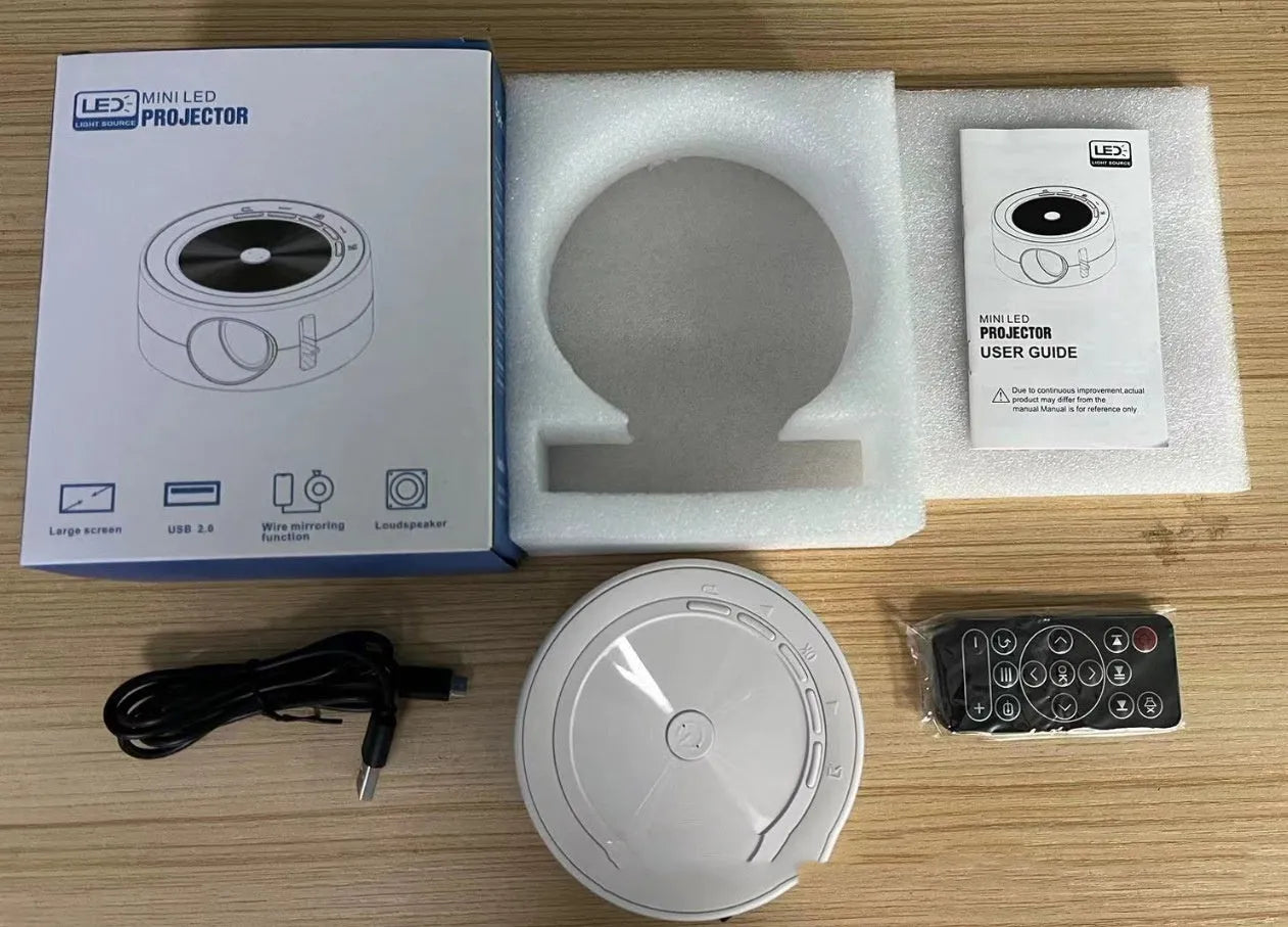 YT200 portable wired LED projector in black colour with remote control