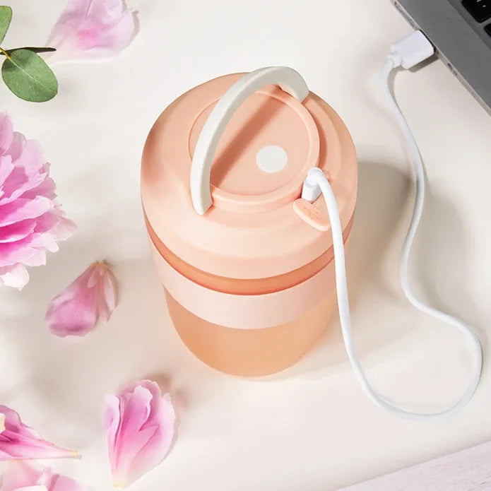 Grape purple portable rechargeable blender cup with lid, 400ml capacity, shown with USB cable.