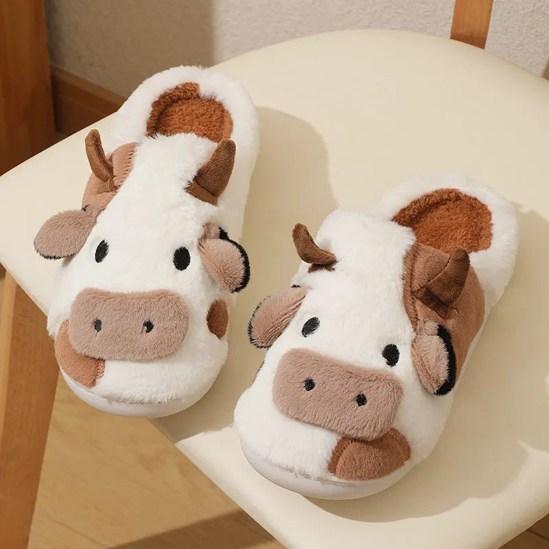 White cartoon cow slippers for women with soft faux fur and textured anti-slip soles