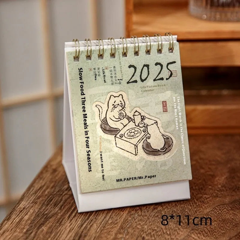 2025 mini desk calendar set showing four different paper calendar designs including Coffee Time theme