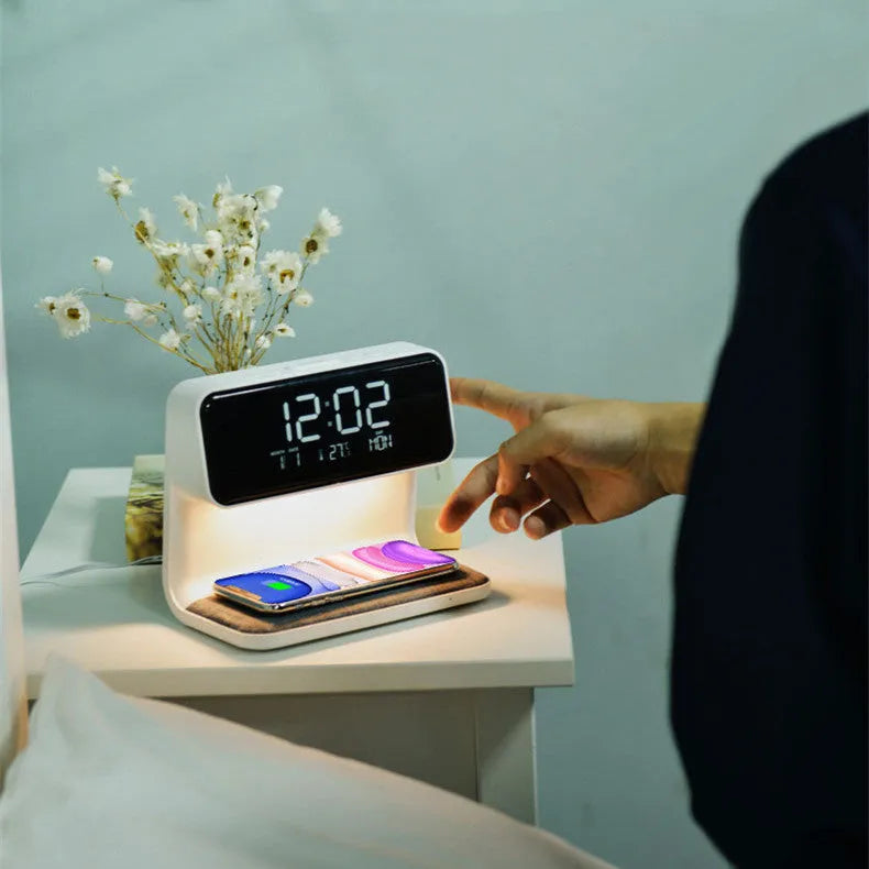 White 3-in-1 bedside lamp with wireless charging pad, LCD clock screen, and touch dimming controls
