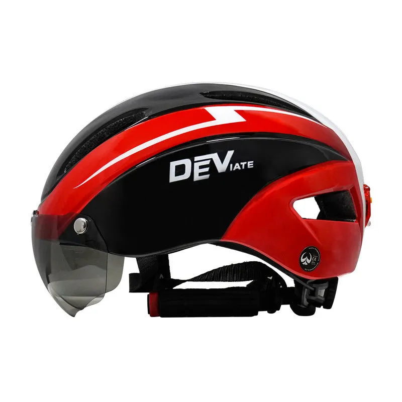 Adult bicycle helmet with integrated red taillight on the rear, shown in a black and blue colour variant.