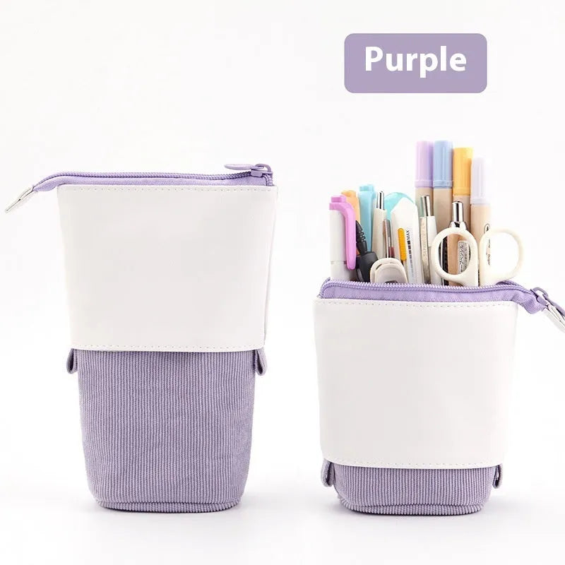 Purple PU corduroy drop-down telescopic stationery case on a desk
