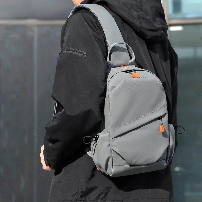 Men's black casual crossbody bag made from waterproof polyester with single shoulder strap