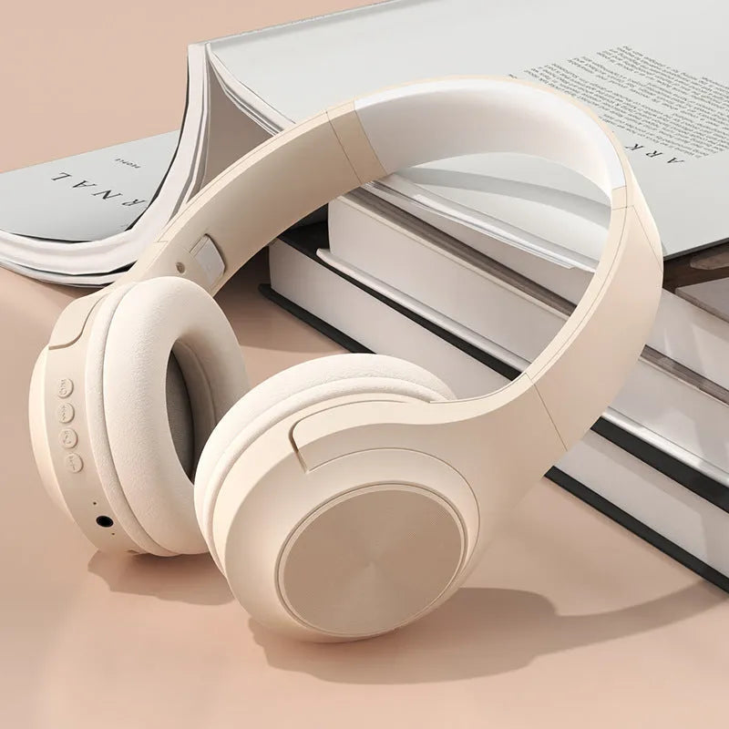 Creative design wireless Bluetooth headset shown in Ivory White, Chalk Black and Youth Green colour options.