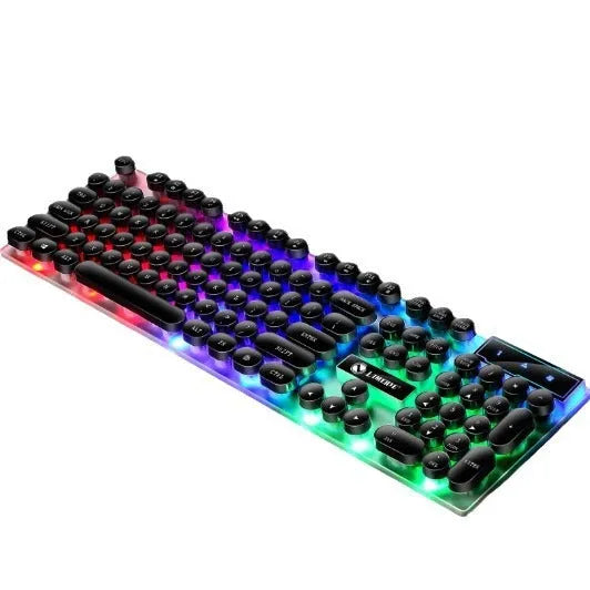 TX35 mechanical feeling keyboard in white colour with USB cable connected to laptop