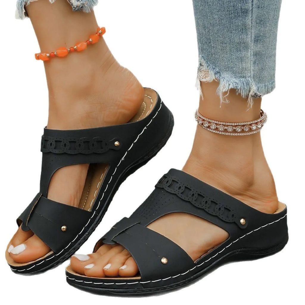 Roman style slippers with fish mouth toe and slope heel in multiple colour options.