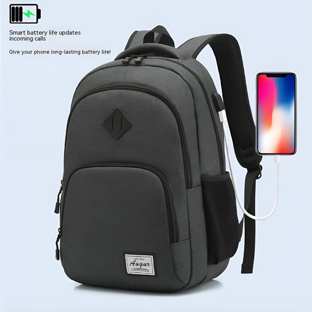 Grey lightweight backpack with USB charging port and trolley strap, showing dimensions 32cm x 15cm x 46cm.