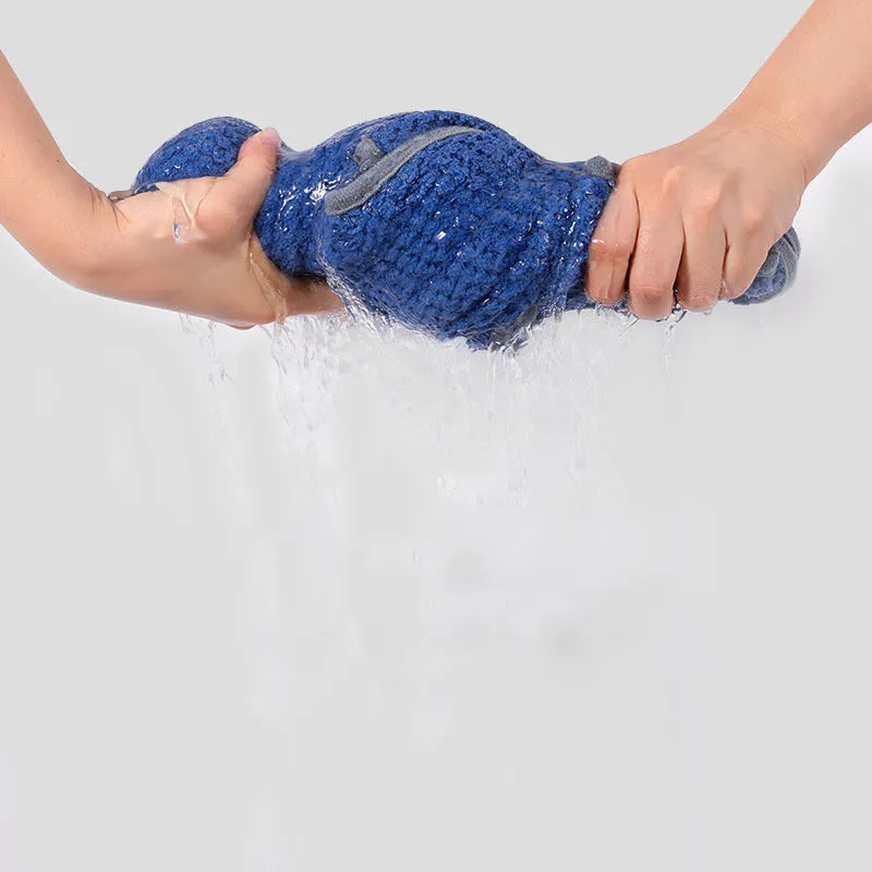Blue microfiber dog bath robe towel with adjustable waistband wrapped around a dog