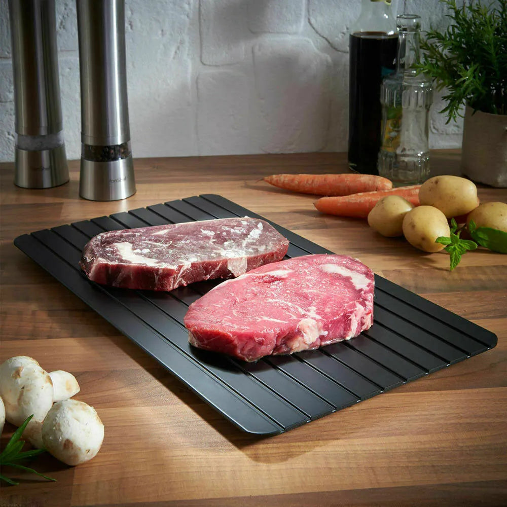 Black aluminium fast defrost tray for thawing frozen food