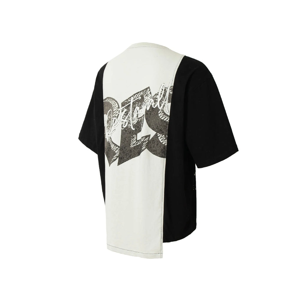 Men's black and white deconstruction print cotton blend t-shirt with a loose fit and short sleeves.