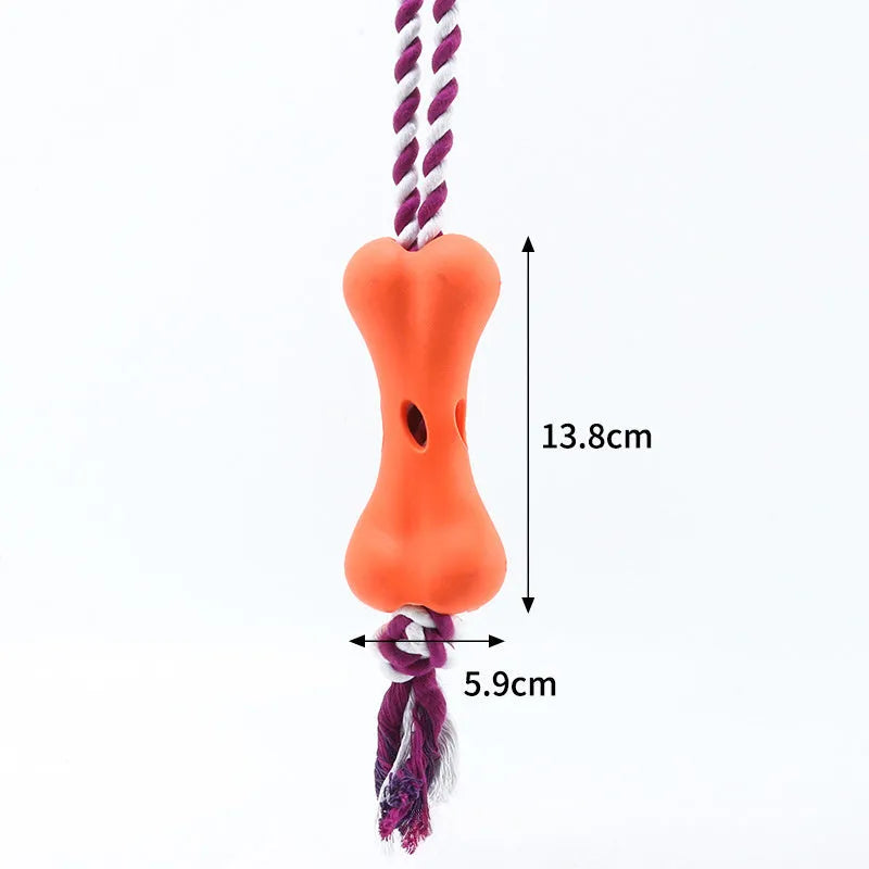 Small green bone-shaped rope knot dog toy with porous openings for treats