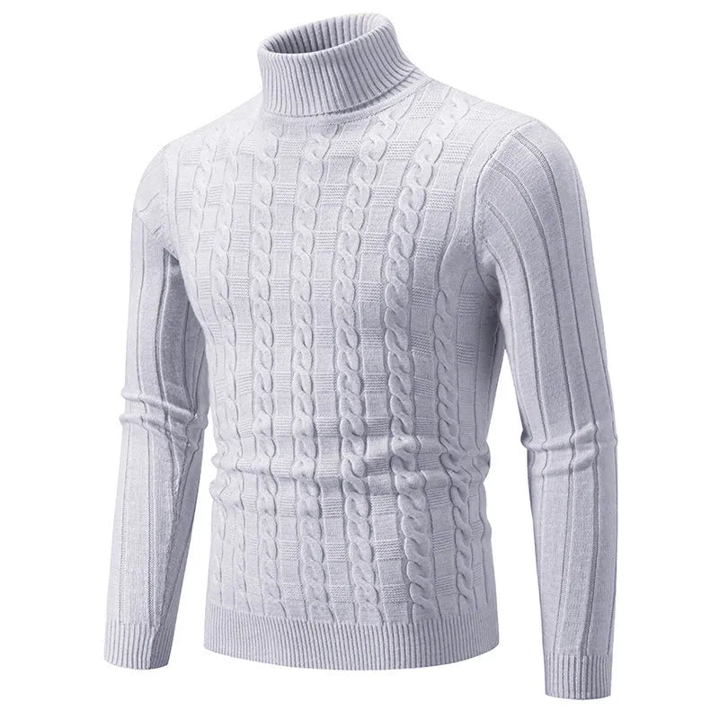 Man wearing a milky white slim fit chenille turtleneck pullover sweater.