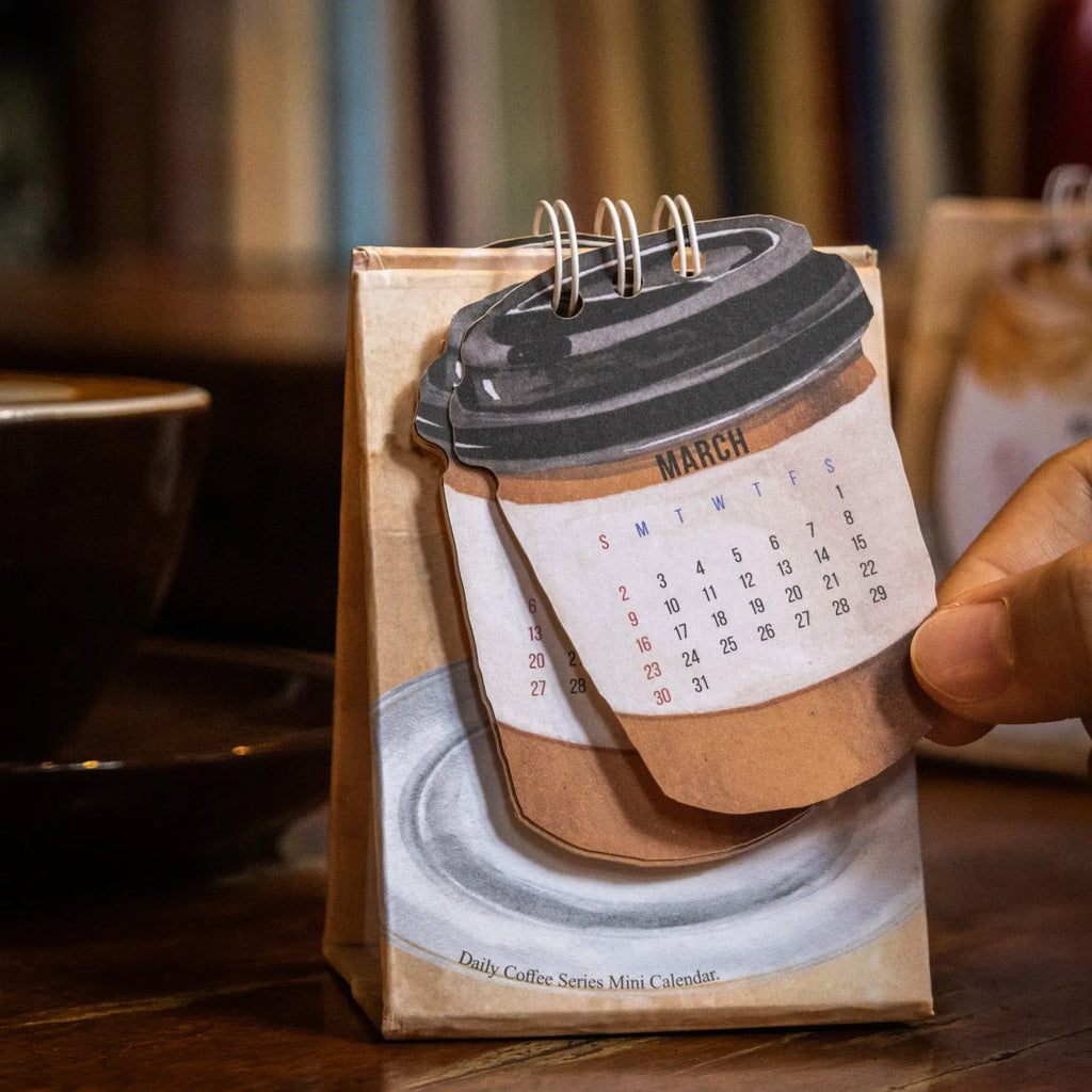 2025 mini desk calendar set showing four different paper calendar designs including Coffee Time theme