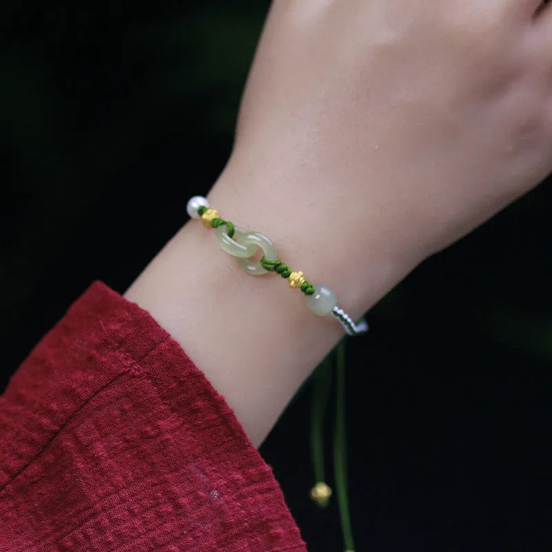 DIY woven bracelet kit showing Hetian jade beads, flexible wire, and silver or gold plated clasps for jewellery making