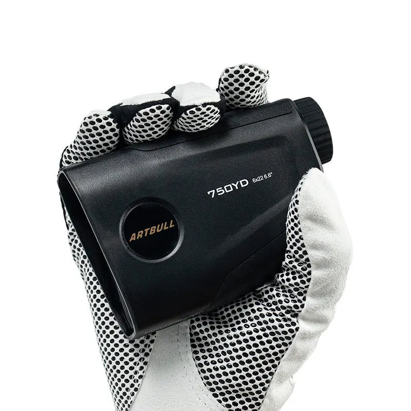 Golf laser rangefinder with LCD display showing distance measurement, USB Type-C charging port visible