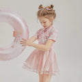 Kids' patchwork pattern two-piece swimsuit with short sleeves and briefs bottoms in various size options