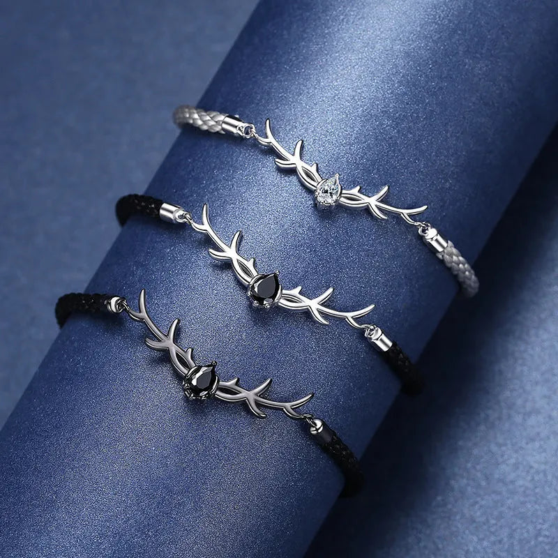 Yi Lu Has You braided rope bracelet in copper with animal zodiac design on display